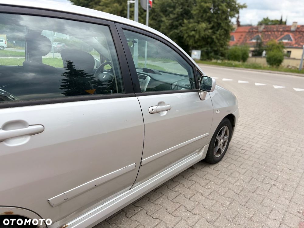 Suzuki Liana 1.6 - 12