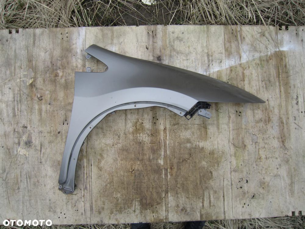 Błotnik przód przedni prawy Honda Civic VIII Ufo NH701M