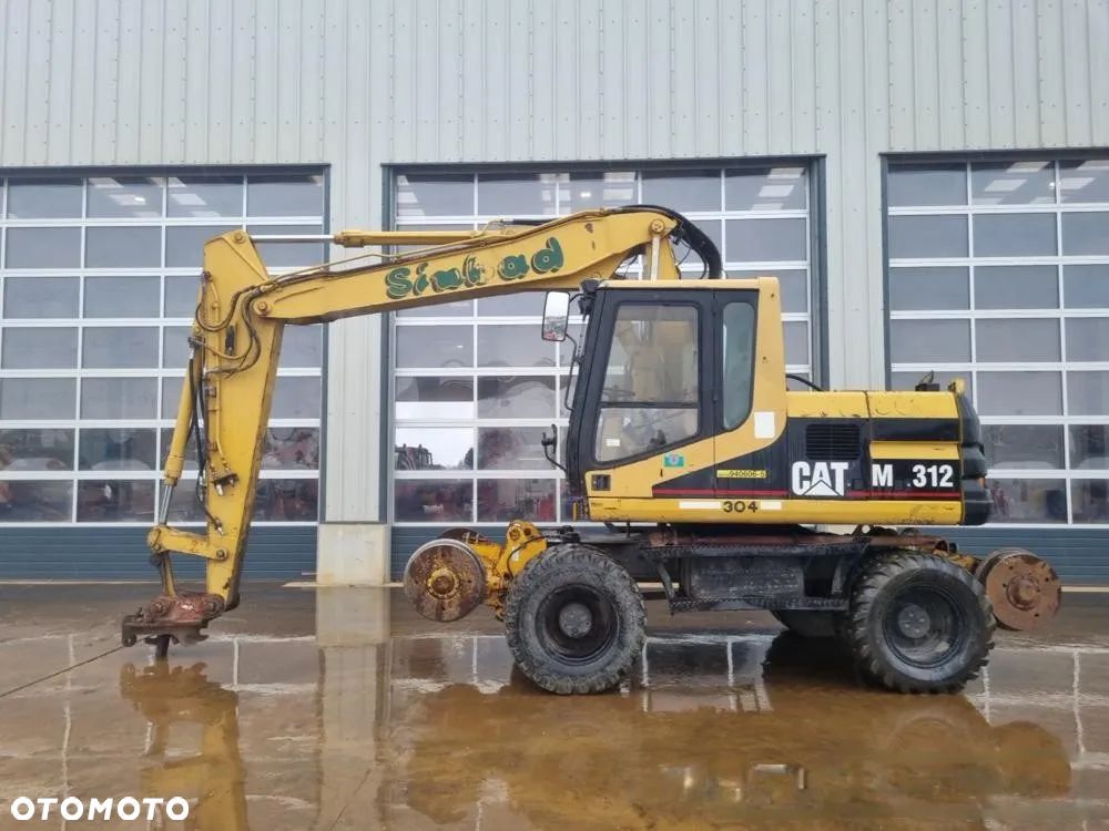 Caterpillar M312 - 1