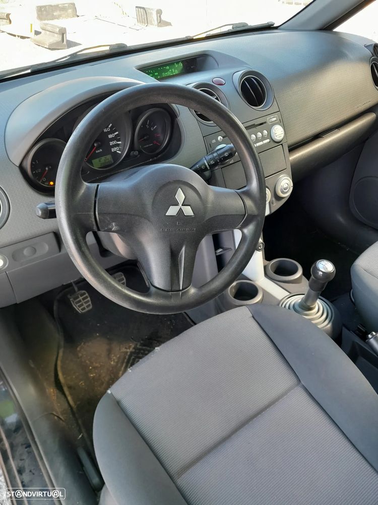 Mitsubishi Colt 1.1 Inform — fotografia 12