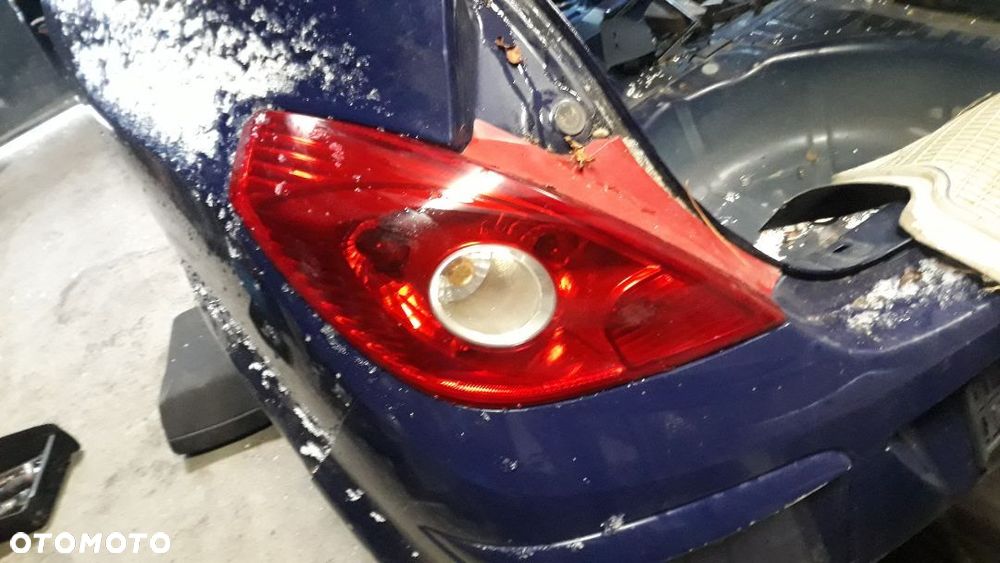 LAMPA TYŁ Opel Corsa D  3 drzwi  lewa  Europa - 1