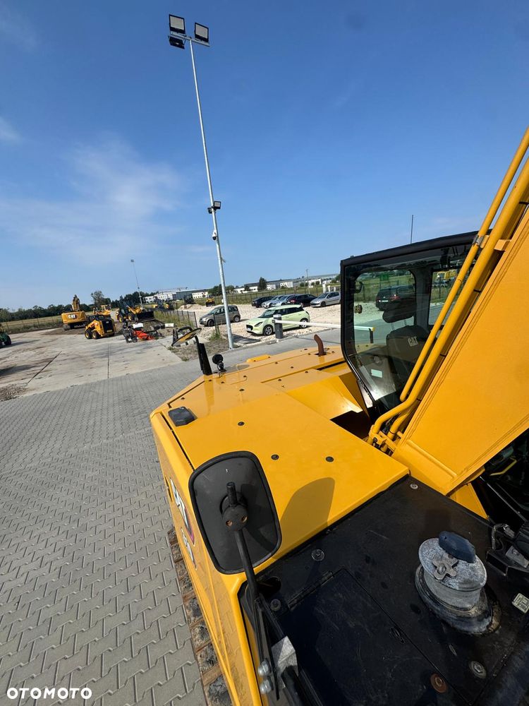 Caterpillar 310 - 9