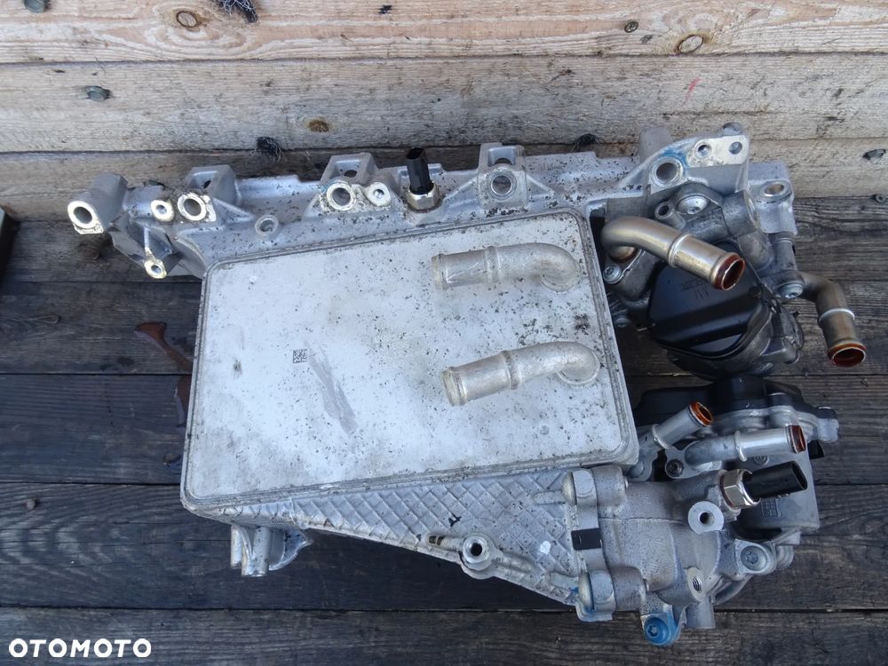 KOLEKTOR SSĄCY 04L129766AQ VW AUDI SKODA PRZEPUSTNICA - 1