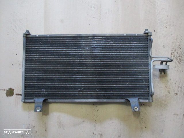 Radiador AC 595X320 KIA SHUMA 1999 1.5 - 3