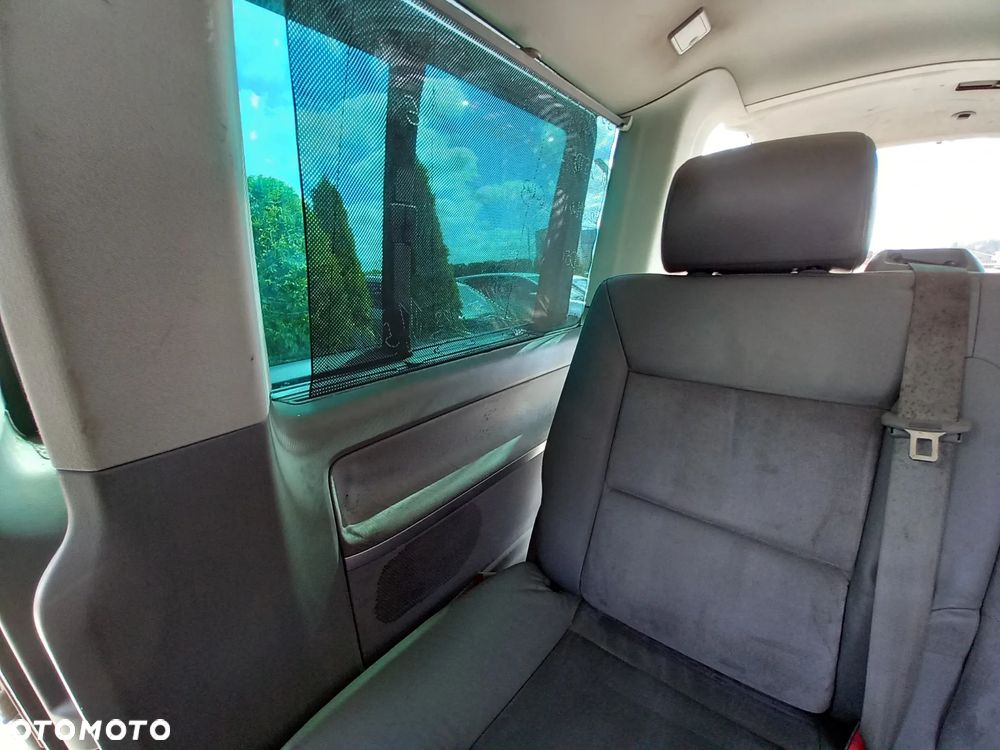 VW TRANSPORTER T5 MULTIVAN KOMPLETNA PRZEKŁADKA FOTELI DYWANÓW PODSUFITKI BOCZKI SŁUPKI NA MULTIVAN KOMPLET Z STOLIKIEM I ROLETĄ SKÓRA ALCANTARA - 17