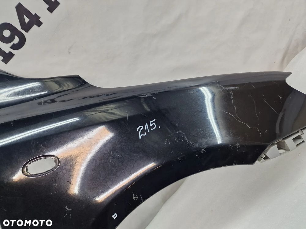 MAZDA 2 03-07 PRAWY BŁOTNIK PRZEDNI PRZÓD , NR AUKCJI BŁ215 - 11