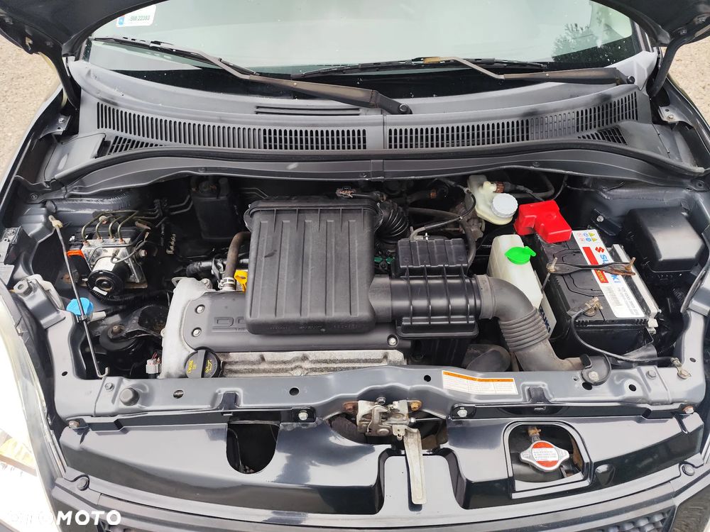 Suzuki Swift 1.3 GLX - 11