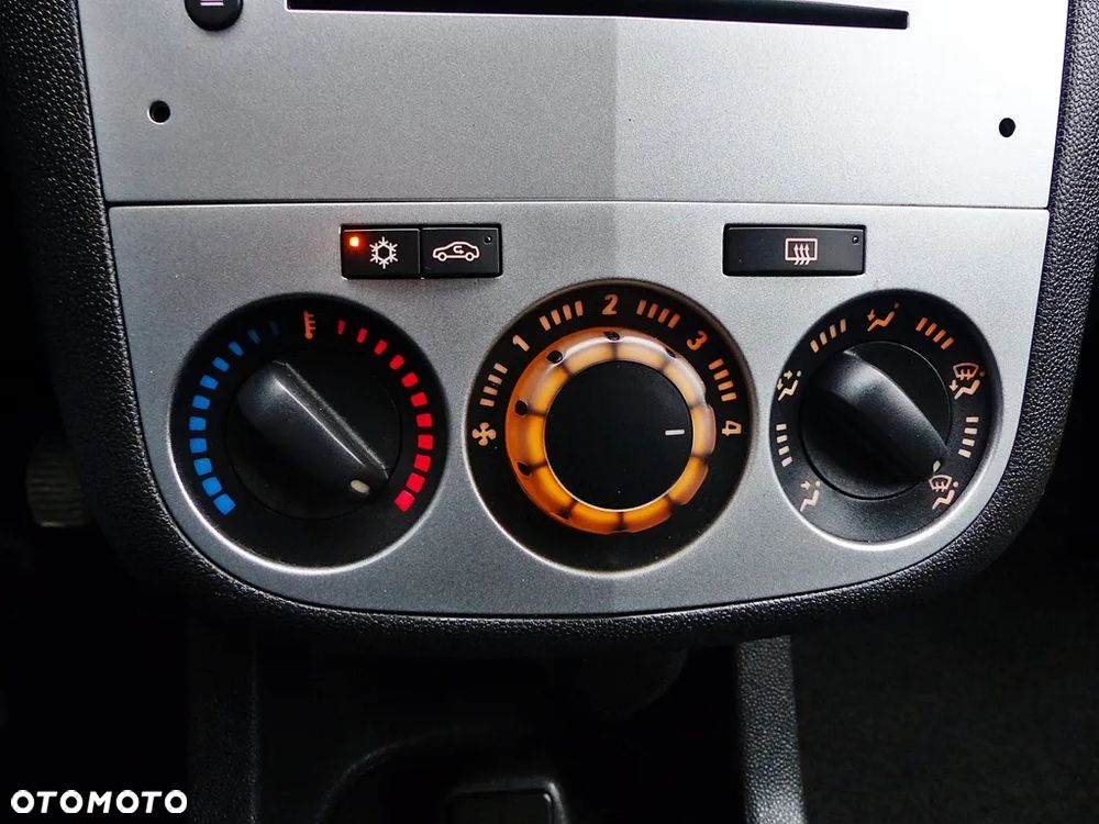 Opel Corsa 1.2 16V Enjoy - 33