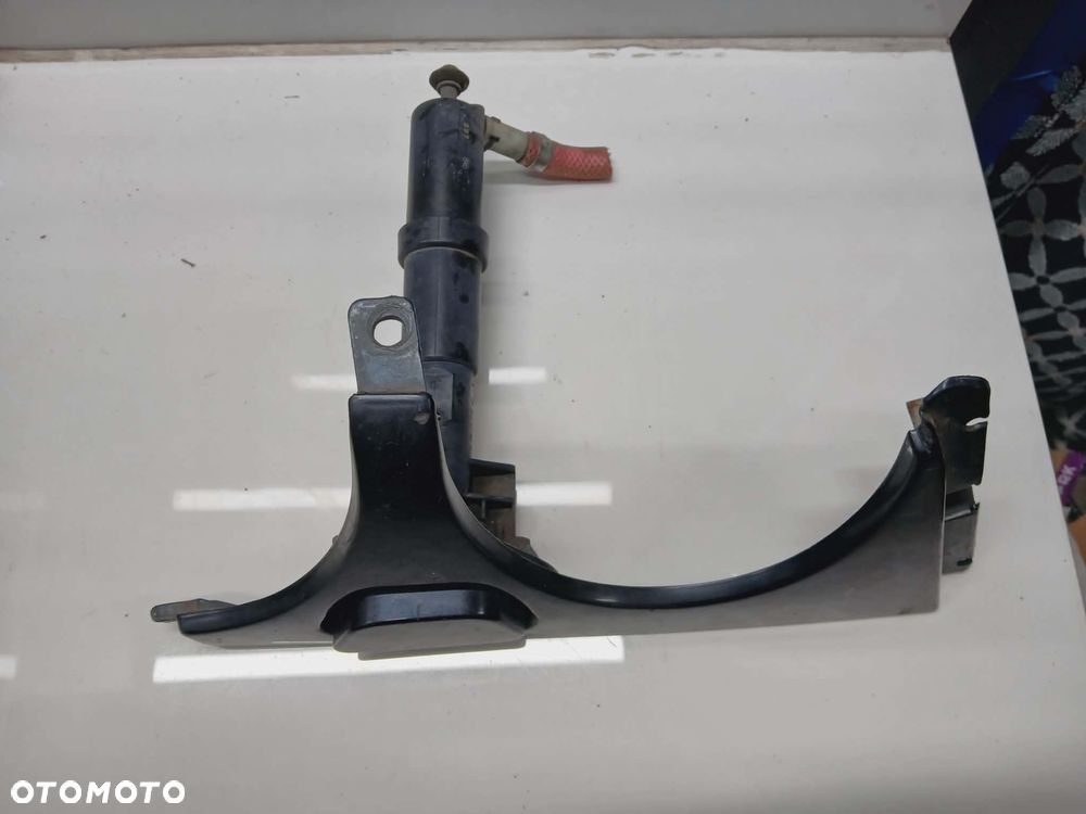 LISTWA LEWA POD LAMPE SPRYSKIWACZ LEWY LAMP MERCEDES W210 2108200412 - 2