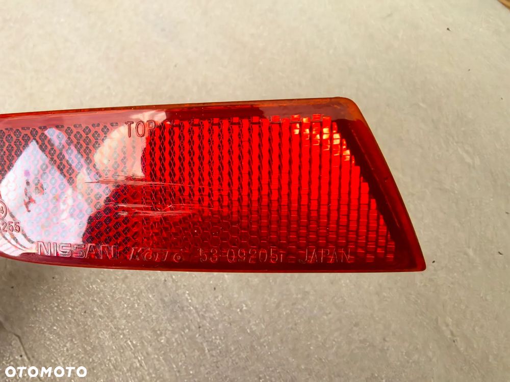 Nissan Note I Odblask zderzaka lewy tył - 2