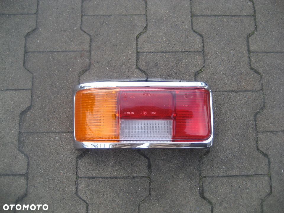 mercedes 115 w115 w 115 lampa tył lewa chrom 1158260551