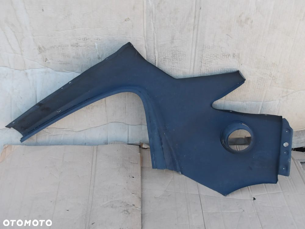 BLOTNIK PRAWY TYL OPEL CORSA D 5D - 6