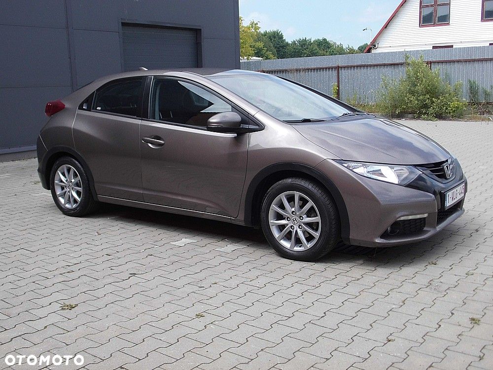 Honda Civic 1.4 i-VTEC Elegance - 27