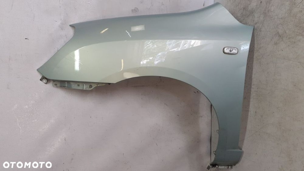 * KIA CARENS 3 III  BŁOTNIK PRZÓD LEWY A5 SELEDYNOWY - 1