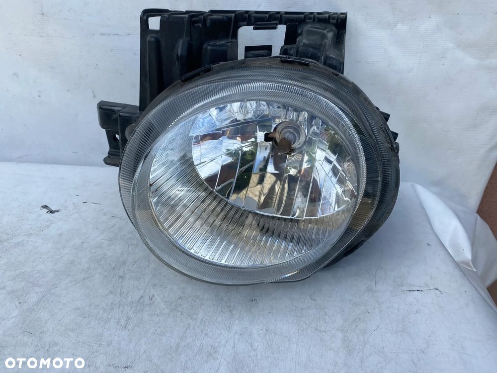 lampa juke F15 H4 lewa eu cała - 1