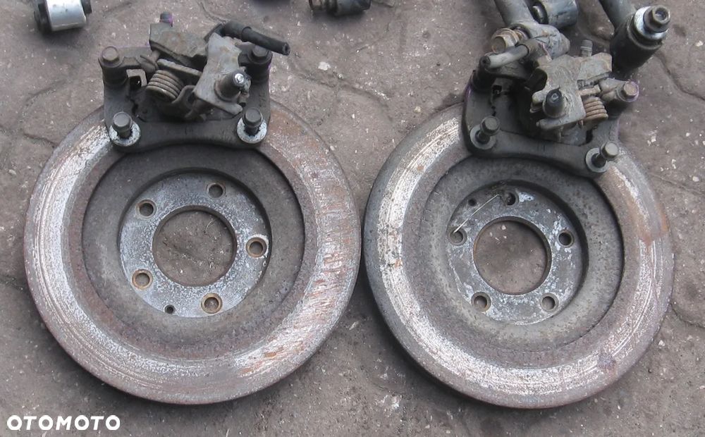 zacisk tył tarcze MAZDA RX8 MX5 - 1