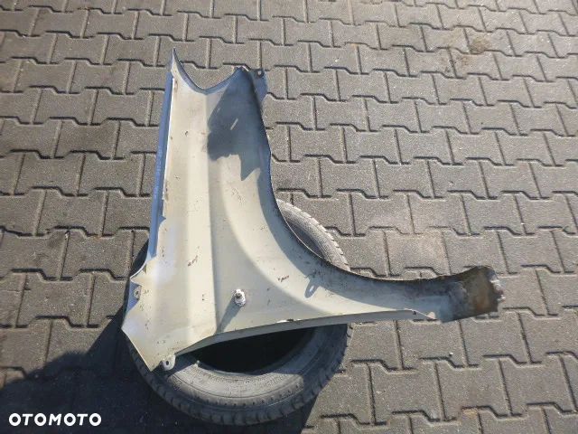 BŁOTNIK LEWY PRZÓD LEWY PRZEDNI CHEVROLET AVEO II T250 07-11 - 10