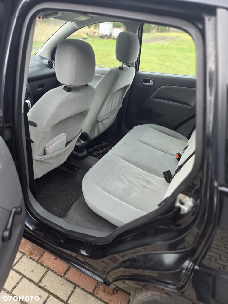 Ford Fiesta 1.4 Ghia - 11