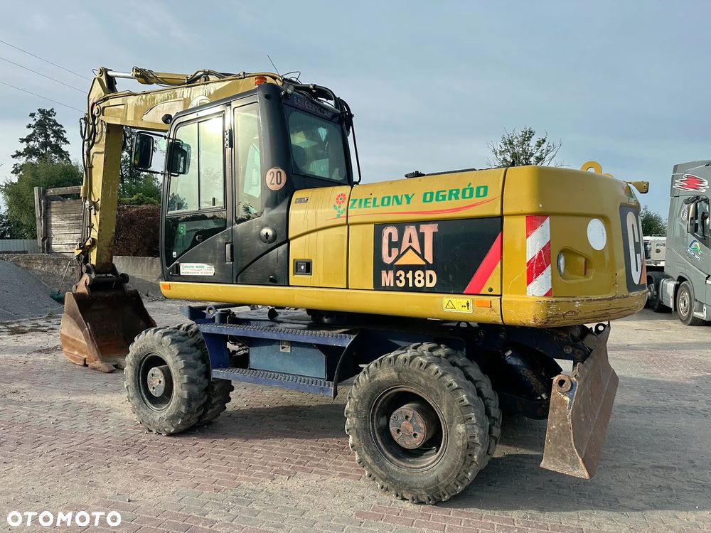 Caterpillar 318 D - 7
