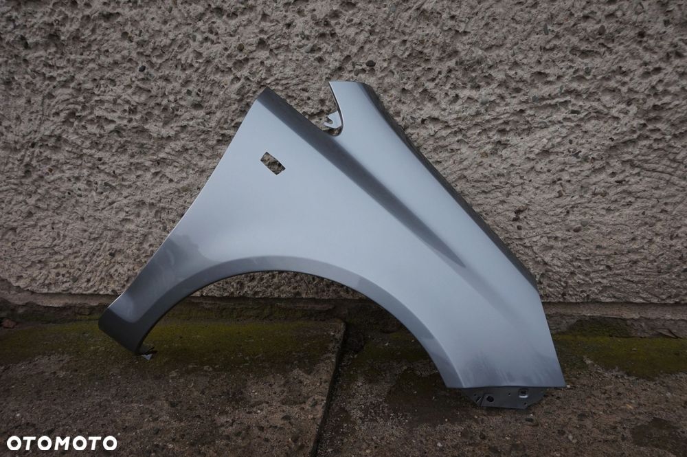 BŁOTNIK PRZEDNI PRAWY OPEL CORSA D Z179 - 1