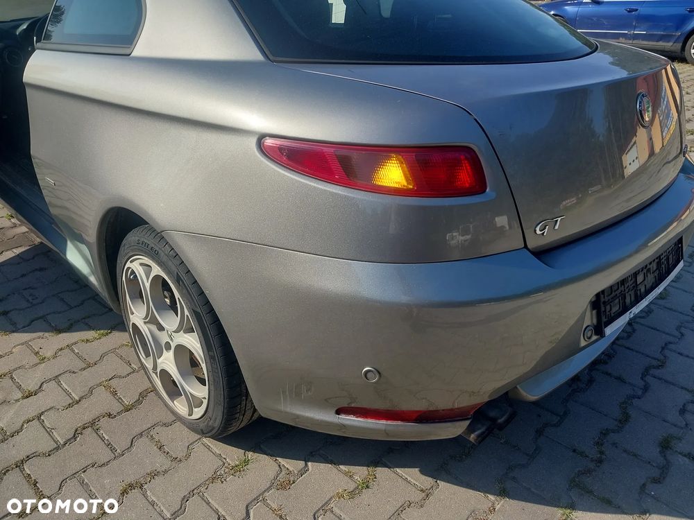 Alfa Romeo GT Q2 silnik 1.9 JTD 150KM 937A5000 skrzynia biegów 464332891 przepustnica alternator pompa wtryski maglownica belka zawieszenia mcperson tłumik wydech kolektor podszybie podsufitka szyba zbiorniczek sanki zamek zacisk hamulcowy NA CZĘŚCI WSZYSTKIE CZĘŚCI - 7
