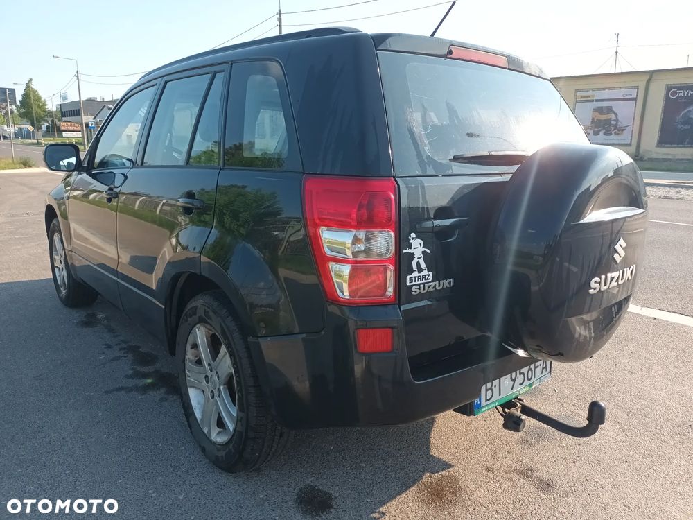 Suzuki Grand Vitara 2.0 - 7