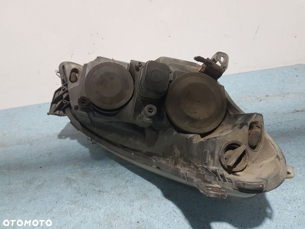 OPEL ASTRA H REFLEKTOR LEWY - 2