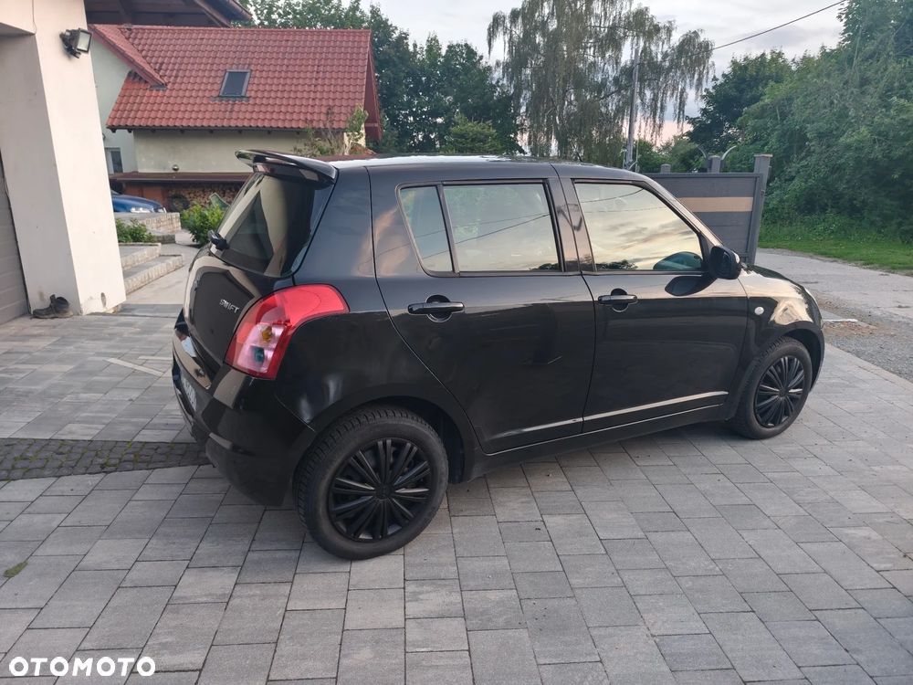 Suzuki Swift 1.3 Club - 11