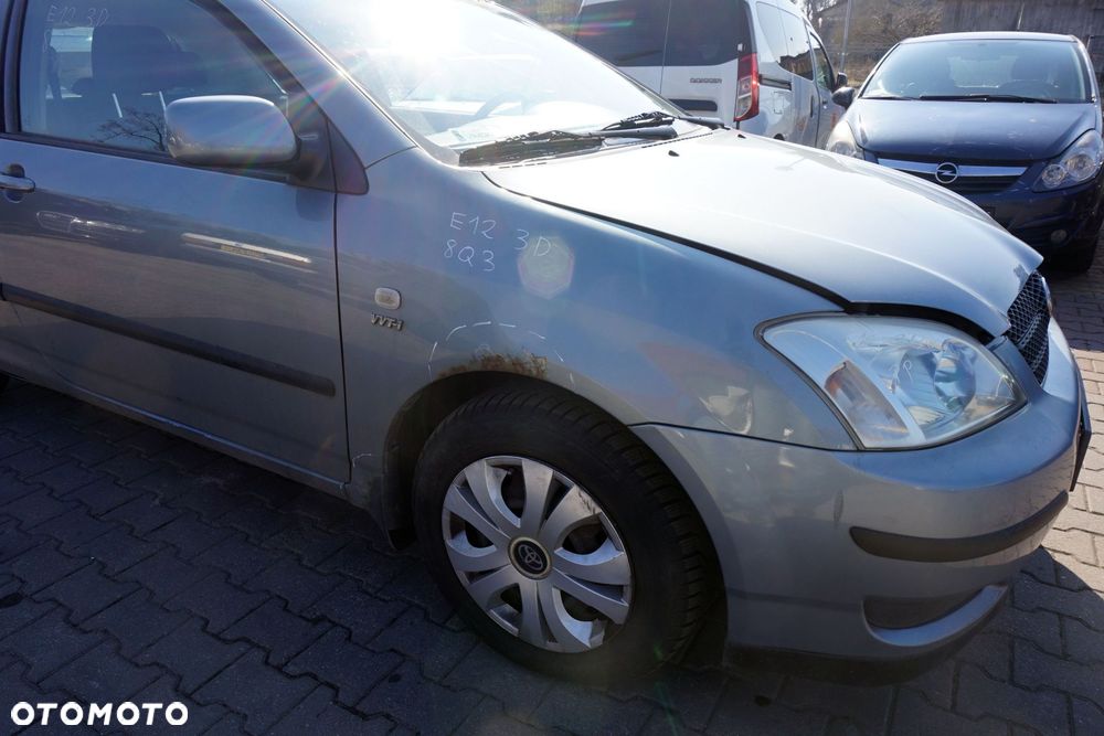MASKA ZDERZAK BŁOTNIKI LAMPY COROLLA E12 8Q3  TOYOTA 2001-2004 SREBRNY PRZÓD KOMPLETNY - 15