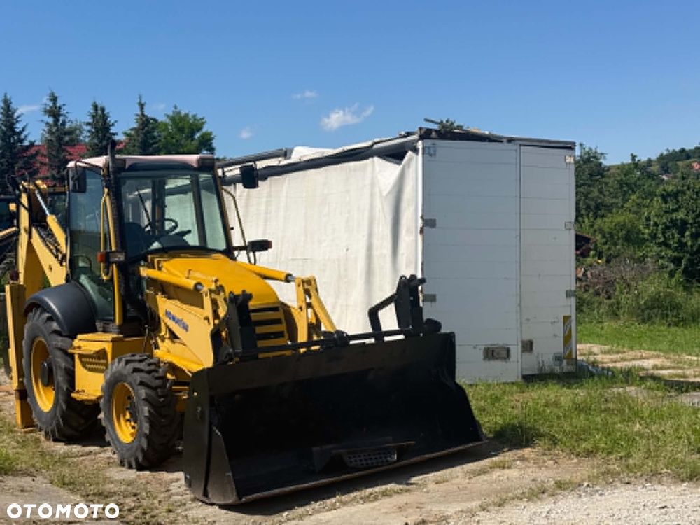 Komatsu Pełna opcja koparko-ładowarka KOMATSU WB07R, TEREX,FERMEC MF 76O - 11