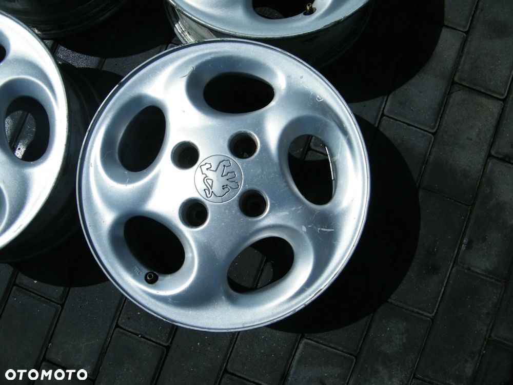 Felgi aluminiowe alufelgi komplet 4x108 ET34/5,5J x 14 otwór 64 - 5