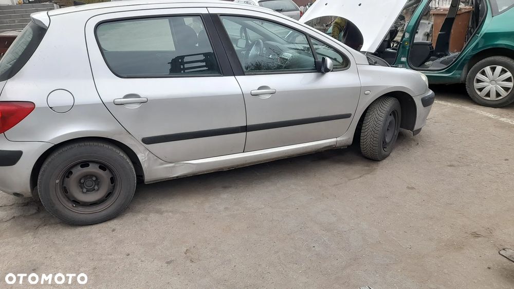 PEUGEOT 307 błotnik lewy przedni   EZR - 4