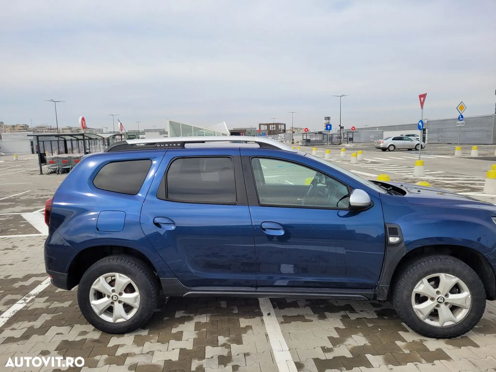 Dacia Duster 1.6 SCe Essential - 29
