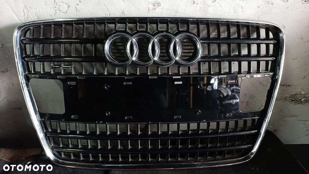 Audi Q7 4L Maskownica / Grill / Atrapa górna chłodnicy 4L0853651A - 1