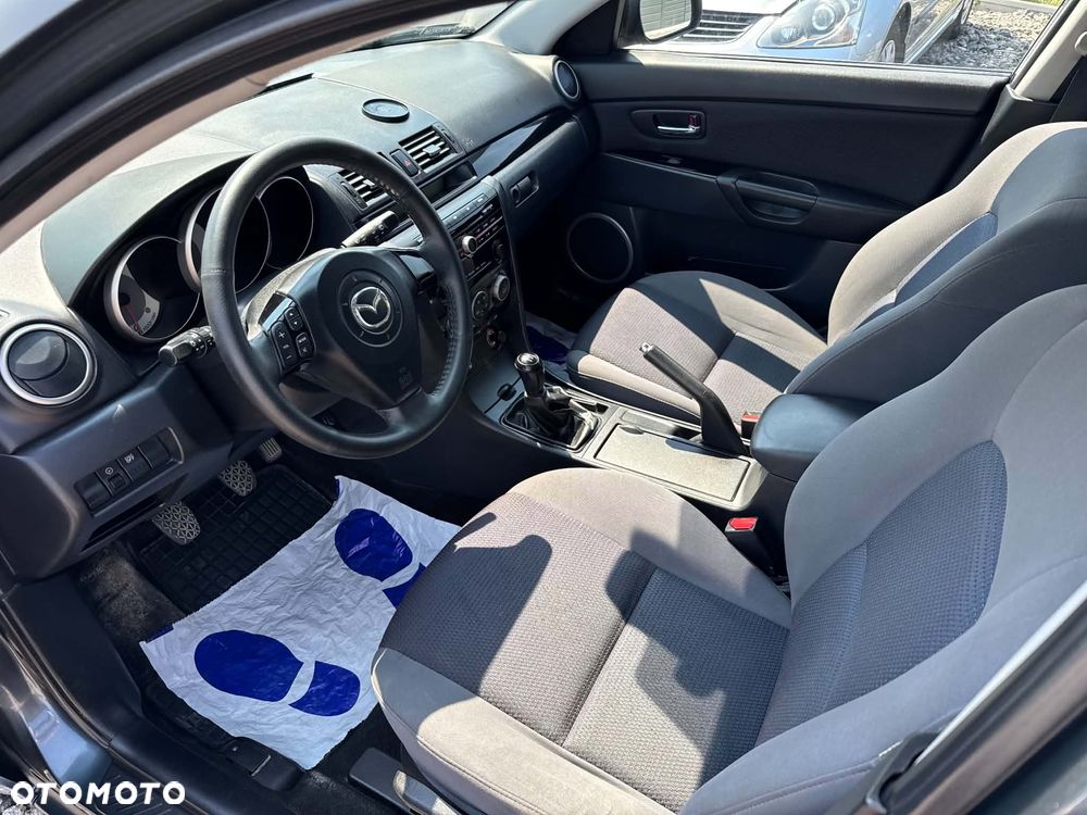 Mazda 3 1.6 Exclusive + - 9