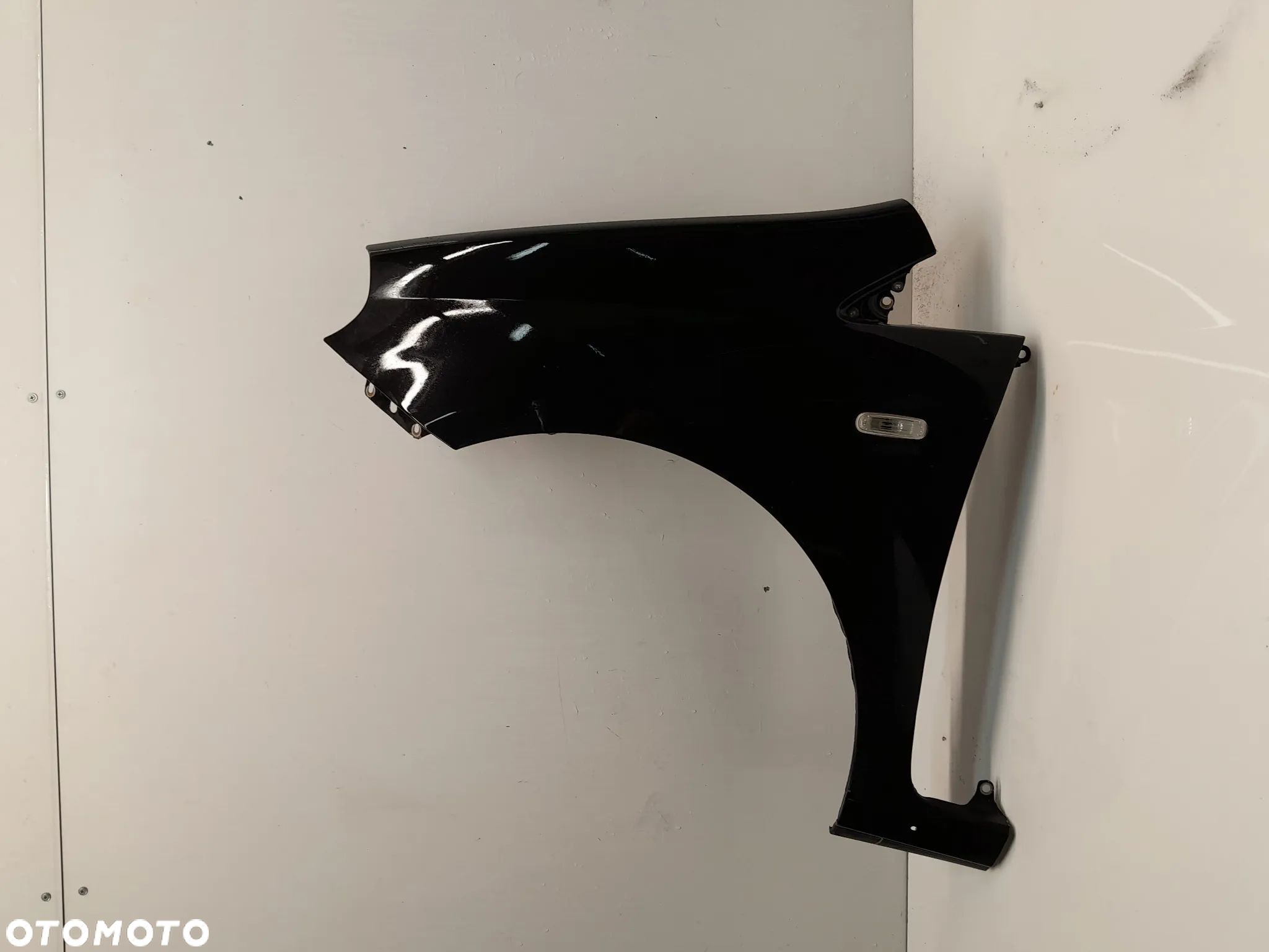 BŁOTNIK PRZÓD PRZEDNI LEWY FIAT GRANDE PUNTO 891/B CZARNY - 1