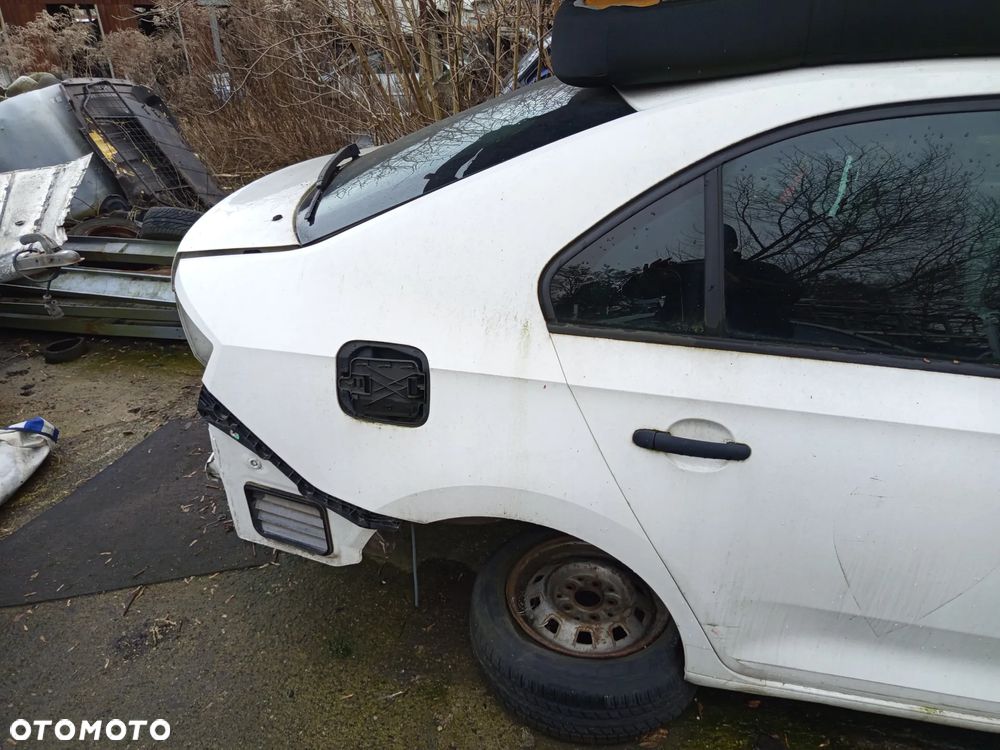 BŁOTNIK TYLNY PRAWY SKODA RAPID LIFTBACK 12- KOD LAKIERU LF9E - 1