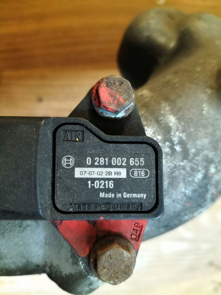 man tgl 8.180 obudowa termostatu z rurą kolektora ssącego 51.06404-3069 - 2
