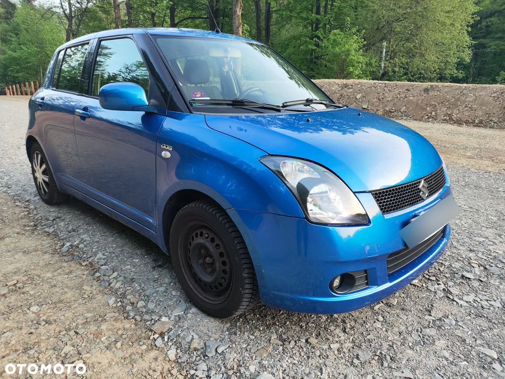 Suzuki Swift 1.3 DDiS 16v GLX - 7
