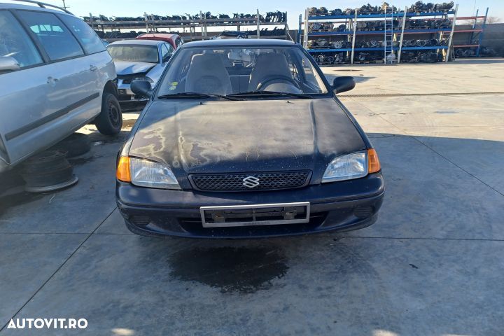 Bara fata Suzuki Swift 2 (facelift)  [din 1996 pana  2004] seria Hatchback 3-usi 1.0 AT (53 hp) - 7
