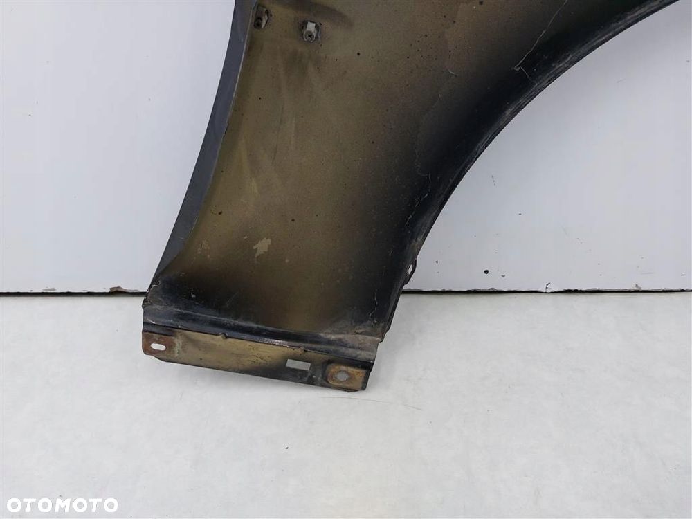 Błotnik przedni lewy Chevrolet Evanda - 11