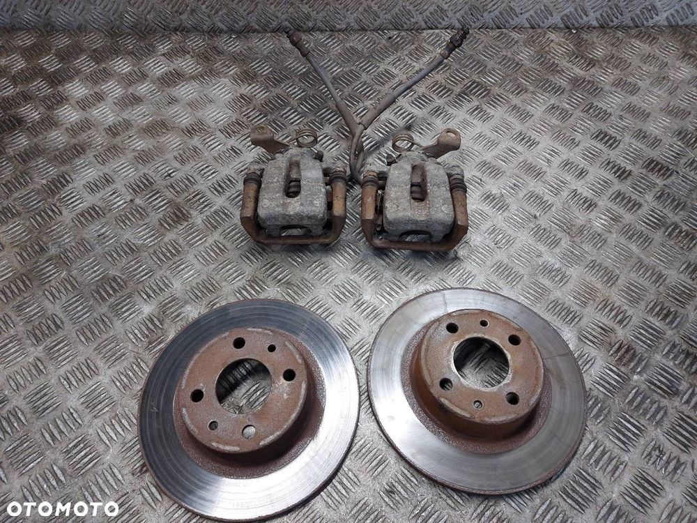 TARCZE HAMULCOWE TYŁ + ZACISKI LANCIA LYBRA I - 1