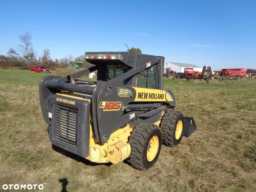 New Holland 2007 New Holland L185 Skid Steer CabHeatAir Pilot CTRLS 2 SPD 2 480 godzin-4200 ładowarka burtowa - 7