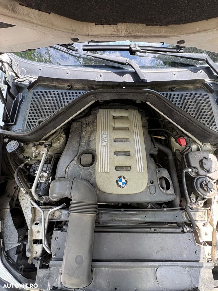 BMW X5 2009 — imagine 13