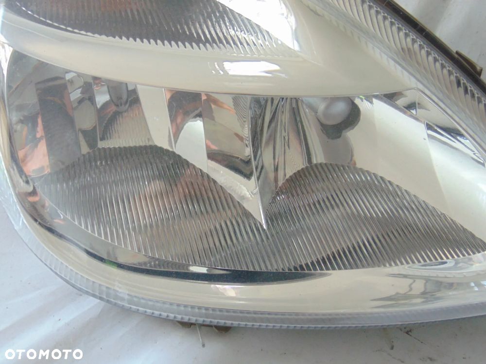 EUROPA oryginalna lampa przednia przód prawa Mercedes W168 A Klasa FL lift 01-04r EUROPA - 2