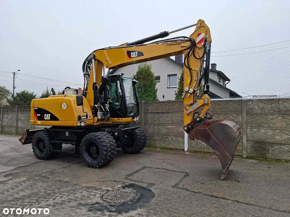 Caterpillar CAT M 313 D - 12