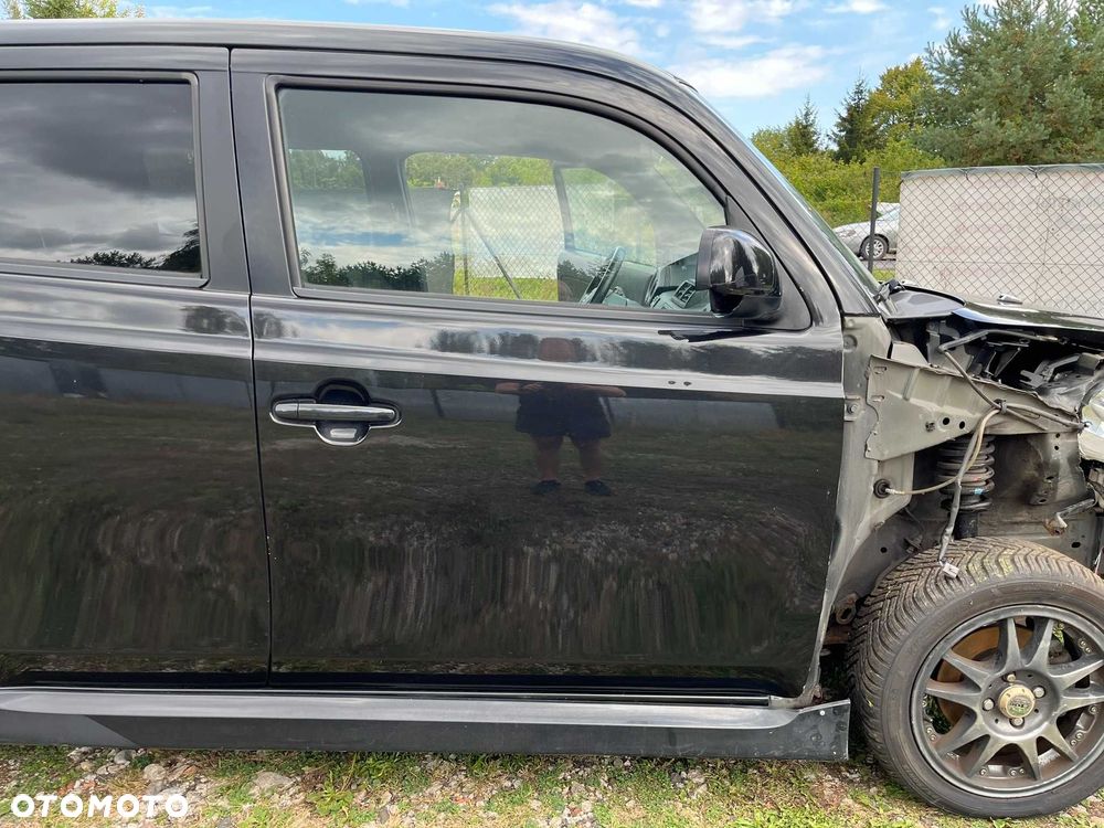 drzwi przód przednie prawe daihatsu materia x07 czarny 2006 - 2011