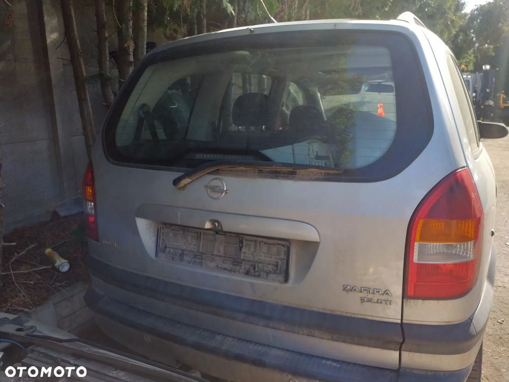 Auto na części - Opel Zafira 116KM benzyna 1999 Silnik Skrzynia Drzwi Maska Klapa Błotnik Zderzak Lampa Szyba Klamka Lusterko Deska Kokpit - 2