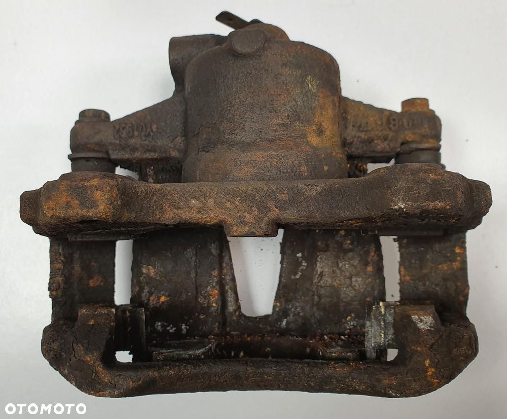 ZACISK HAMULCOWY LEWY PRZÓD FIAT FIORINO 1.3 JTD - 3