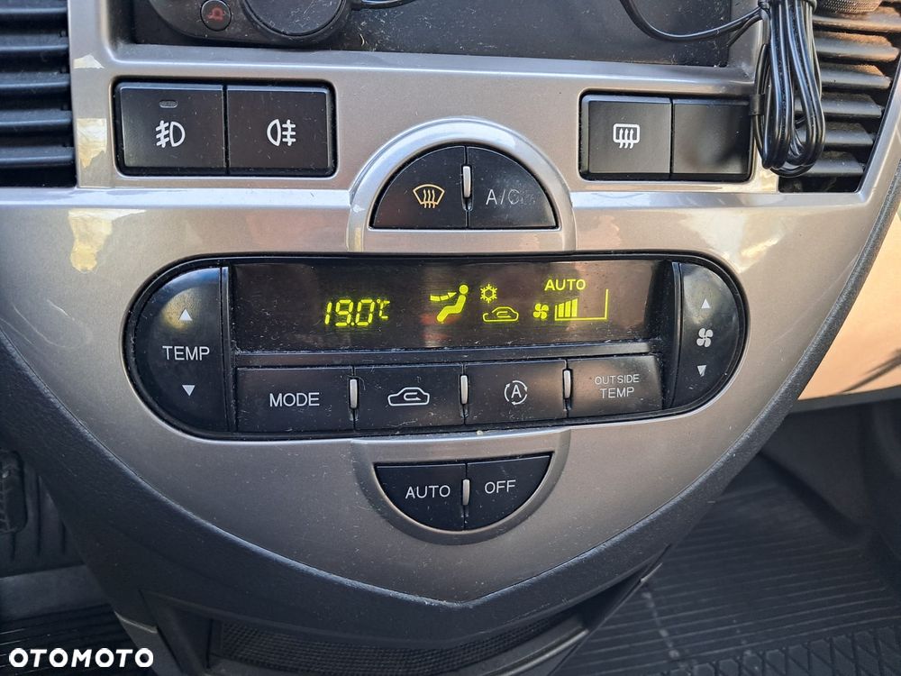 Kia Carens 1.8 EX - 13